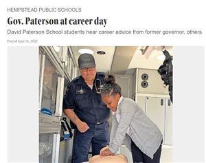 Career Day article cover with student practicing CPR on dummy with EMT overseeing